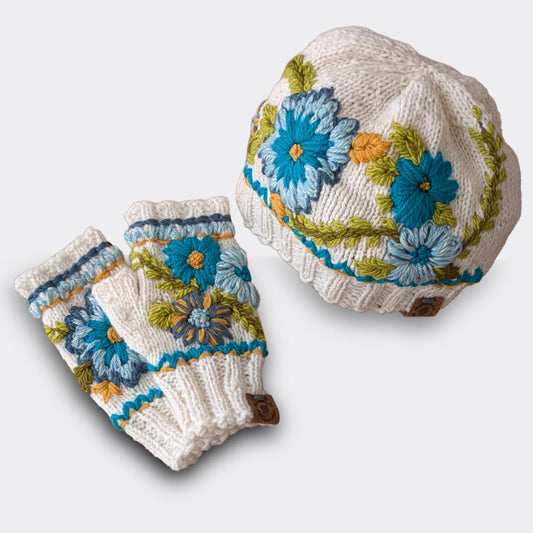 Ensemble "Jardin alpin" - Fleurs bleues et turquoises sur fond blanc cassé.