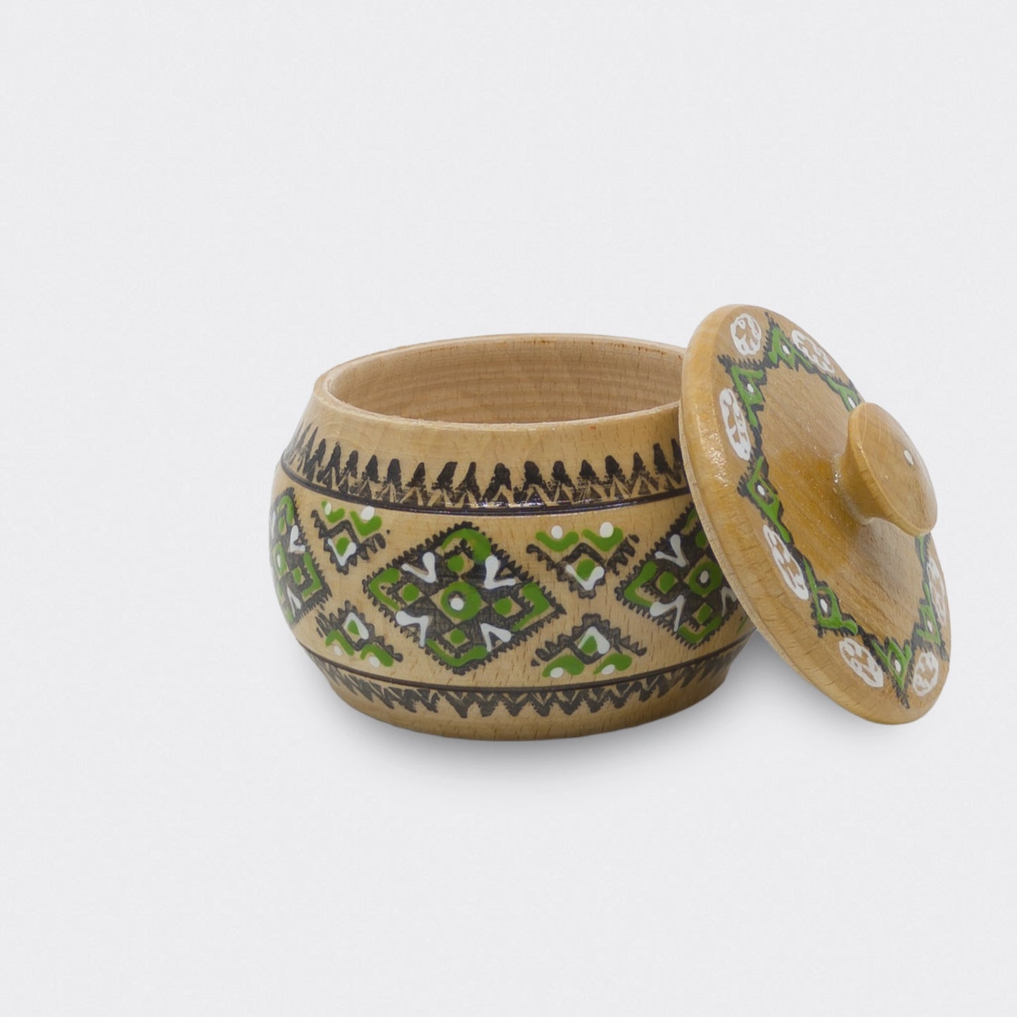 Petite boîte décorative en bois peint à dominante verte. Objet artisanal réalisé en atelier en Ukraine. Modèle1